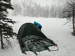 Setting up the tent in a snow squall