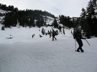 Our route had gone up the snowy slabs in center, then left by the trees on the crest.