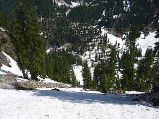 Looking down to Upper Garfield Lake (barely visibe) during our traverse to avoid two high spots on E Garfield's ridge.