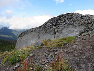 Survey Rock is a knob of Glacier Creek andesite, the same flow or series of flows  that you saw at Kulshan Creek.  The resistant knob is an easy class 2 on the south,  or solid but exposed class 3 on the north....