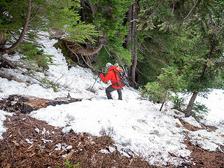 Descending the steep and slippery section just below the ridge