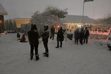 Neighbors having a party in the snow