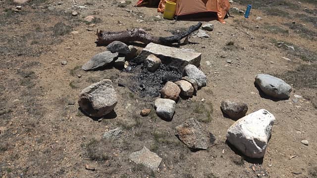 Illegal fire ring. No fires allowed above either 10,400 or 10,900 feet. This lake is a good stretch above 11,000 feet. Time to clean up.