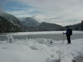 A Hiker look out at Wallace Lake from Pebble Beach