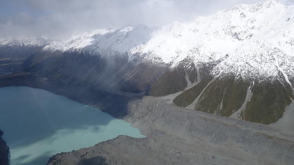 Tasman Lake below at the terminus of the rock strewn Tasman Glacier