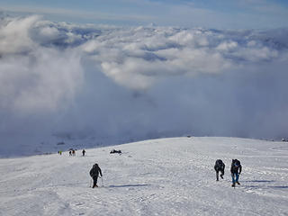 Climbers ascending with Hood behind