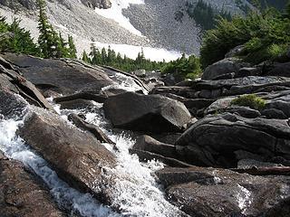 Down the outflow waterfall