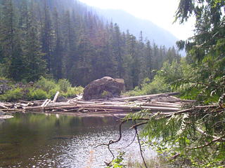 The outflow from Barclay Lake is jammed with logs tied up on talus and a huge boulder.