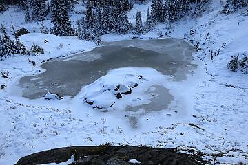 My favorite tarn with more snow on it now