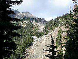 After dropping over Headlee Pass, the trail traverses this talus slope into the small notch visible in the center. Vesper Lake is a short distance beyond.