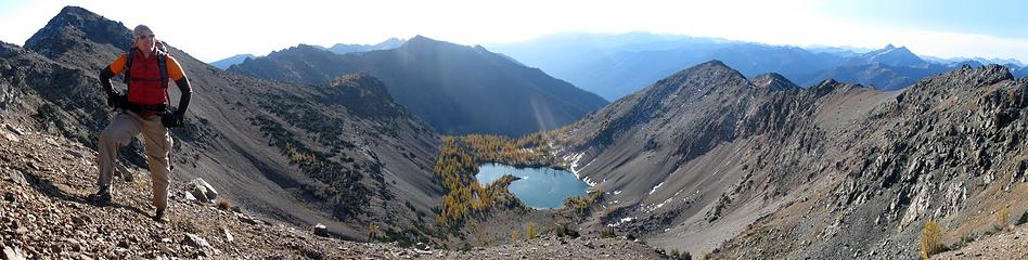 iron posing on abernathy ridge with scatter lake below and reynolds peak on the far right