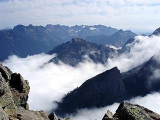 Lewis Peak pokes above the fog, with the N ridge of Morning Star in the foreground, from Sperry's summit.