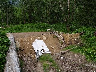 Persis garbage near lake.