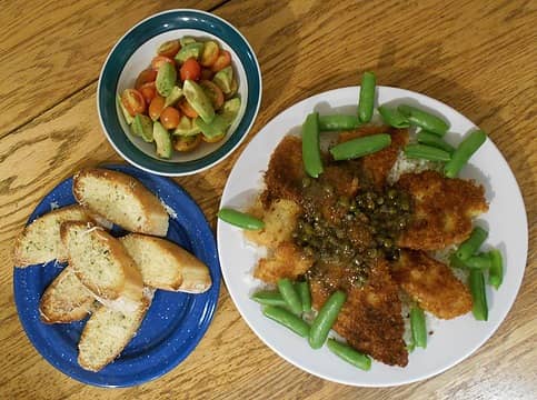 cod with lemon, capers, and dill on basmati with snap peas and salad 10/04/21