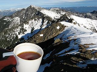 Summit Tea & Mt. Howard.  The wind is actually making waves in my cup.