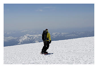 Kyle skiing off the summit.