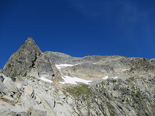 upper east face, go below the lower snow patch, then head straight up blocky rock and keep traversing right