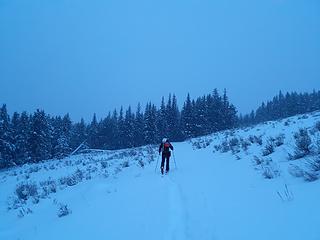 Skiing up the road as the snow showers started