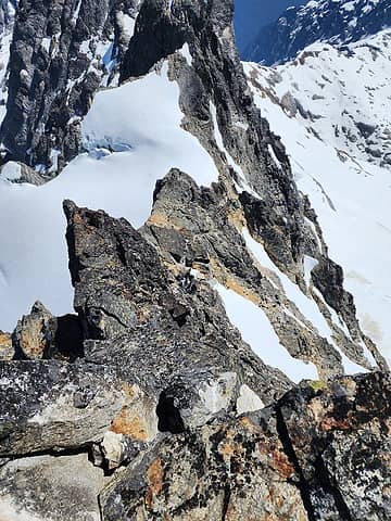looking down at the first rap station on the NW ridge (standard) from the summit