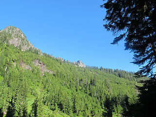 the summit block above, with impenetrable brush wall in the foreground