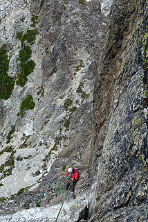 Rap 1, to top of chimney. We chose to do 3 shorter raps on the summit block to lower the chance of a stuck rope in the chimney.