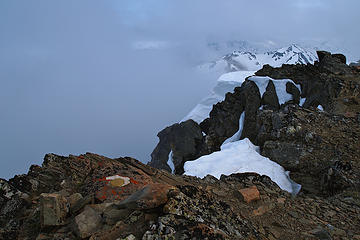 Grey Wolf summit marker. Fog rolling in.