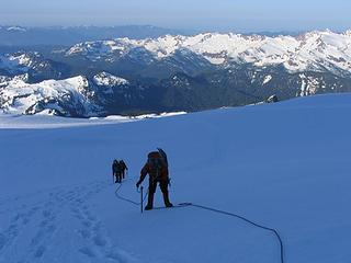 Following the track of footprints up the Easton Glacier