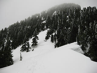 The upper slopes of Baring from just above the steep snow pitch out of the notch.