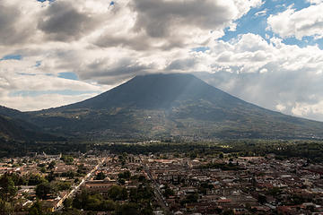 Standing at the top of Cerro de La Cruz, looking down on Antigua with Agua volcano looming in the distance