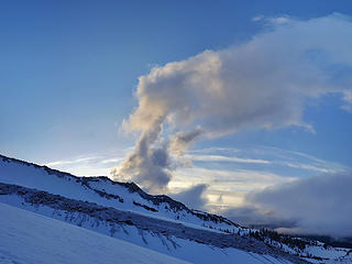 Sunrise lighting on some clouds.