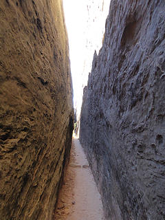 There is a section of trail that squeezes between walls. In some places it is only a few feet wide. I was tempted to chimney up to the top but I didn't want to get stuck up there with no way to get out.