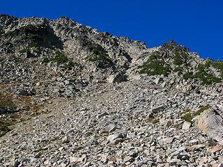 Our route takes the first left-slanting gully left of the col
