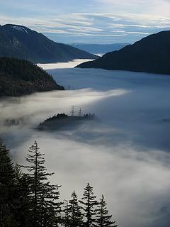 Morning light and shadows on the valley fog