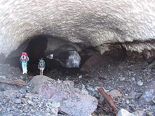 Trinity and Ice Girl entering snow cave at Big Four.