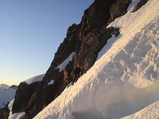 Don begins the ascent up the couloir.