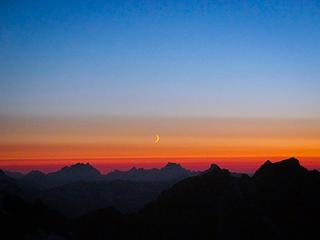 Moonrise over Three Fingers and Whitehorse