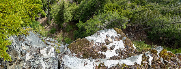 A view down the overhanging cliff taken by holding my camera out as far as I could