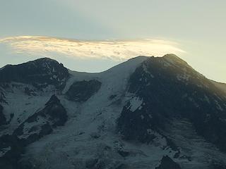 watched this cloud cap form from nothing as the sun was rising, then disappear only to come back as a full lenticular cap.