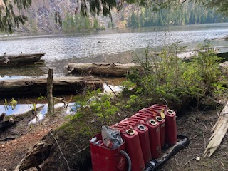 Gas cans left by firefighting crew probably for running water pump