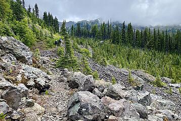 Rocky crossing and steep climb to the lake at the end.