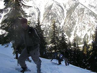 Brad heading up steep slope towards ridge