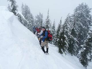 Heading off the summit in the snow