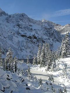 Western ridge above Snow Lake and little frozen pond in the foreground