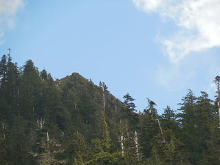 Zoom in on the summit of Chapel Peak from the lake