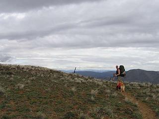 Bob further up the traill with post trail marker ahead