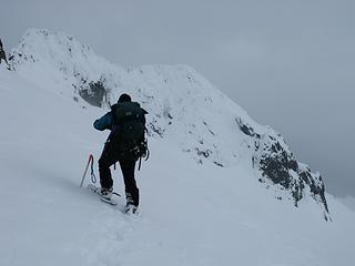 Carla and a brief glimpse of the summit of Icy Peak