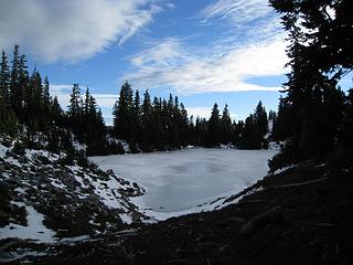 frozen over ridge lake