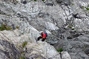 rap 7, the last one, down a wet gully to the benches just above the snow fields