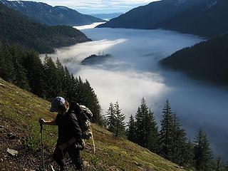 hiker above the fog