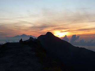 Sunrise and the summit of Gunung Agung, Bali highpoint at 9944.'. Rinjani, the highpoint of Lombok behind.